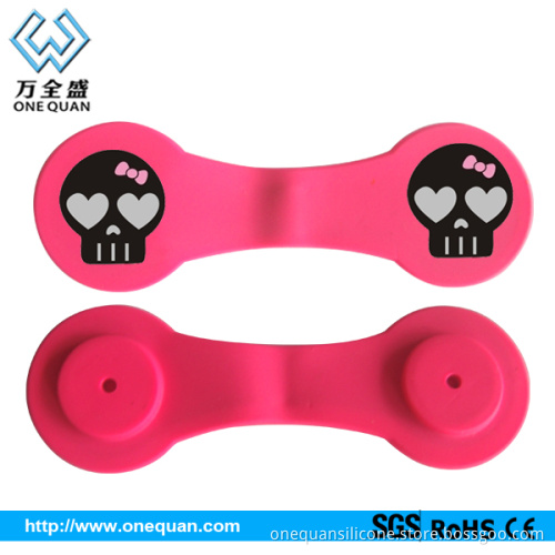 Magnetic cell phone holder and car phone holder